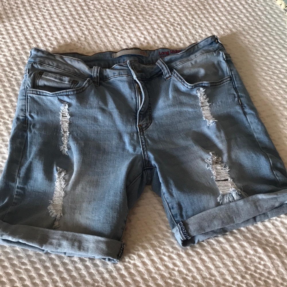 Distressed jean shorts. Size 8